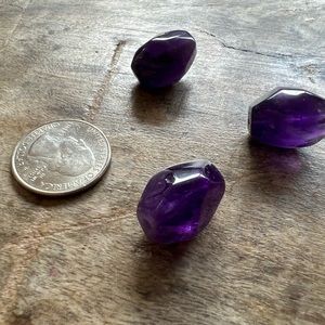 Three large rough cut genuine amethyst beads.